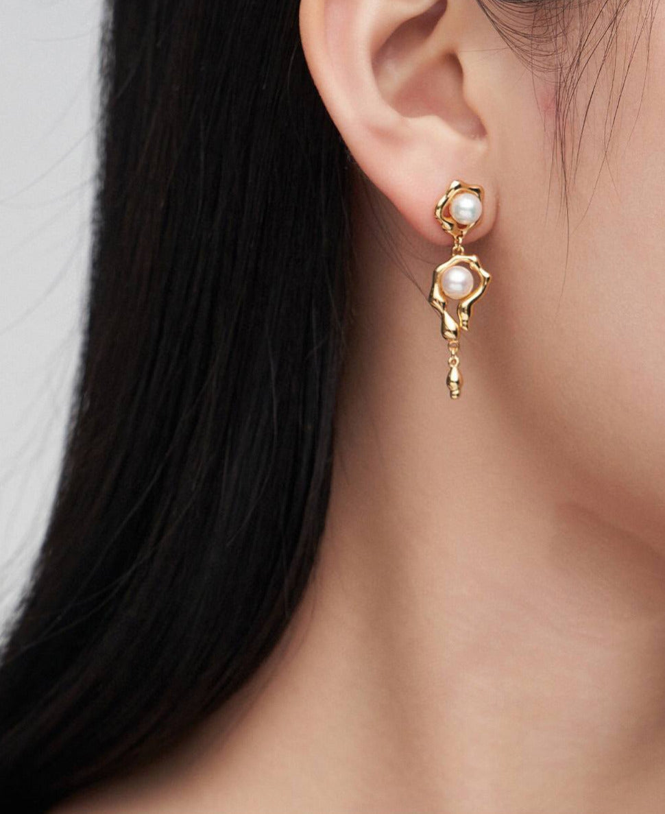 Boucles d'oreilles asymétriques en argent sterling et perles